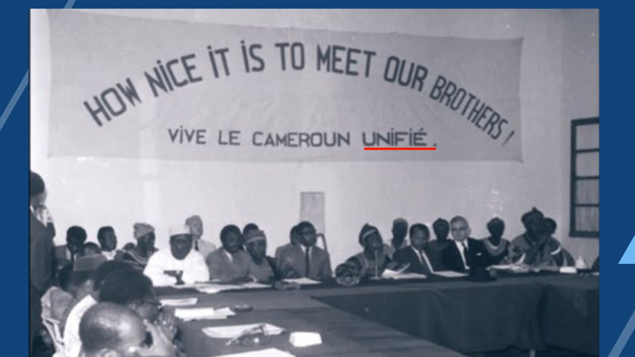 Historical conference photograph supplied by Roland Fru, used for context. The original photographer and complete archival caption were not supplied; individual delegates are not identified from this image.
